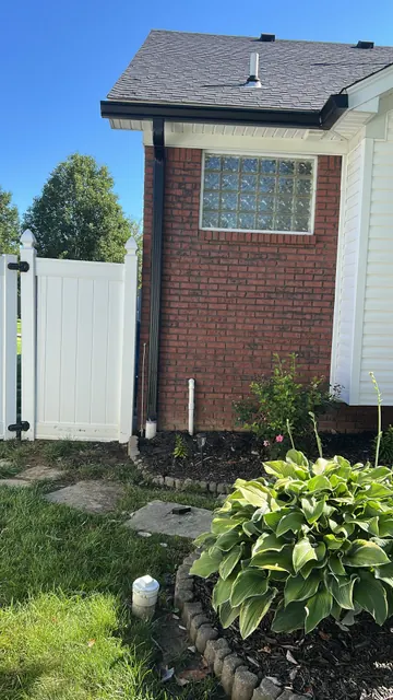 Finished exterior and downspout